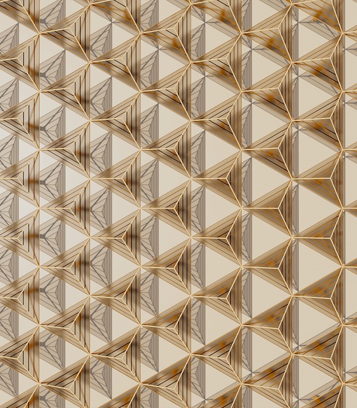 A close-up of a golden geometric pattern creating a stunning visual effect on a textured wall surface.