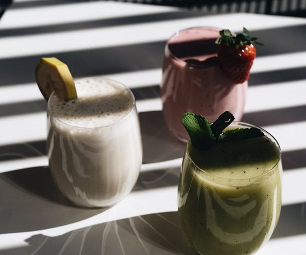 Morning ritual with wellness drinks and nature background